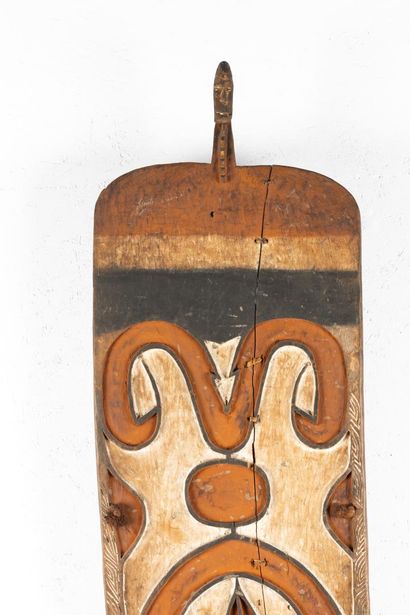 Large war shield surmounted by a representation...