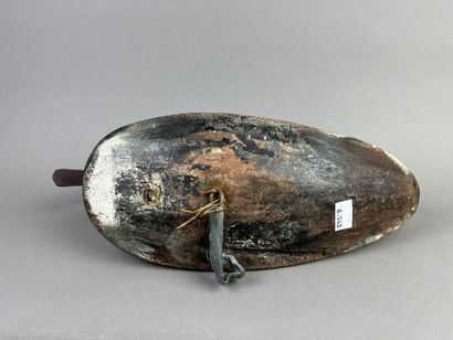Antique wooden duck caller. Presence of its...
