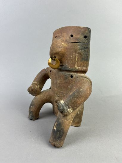 Cacique. Representation of a seated dignitary,...