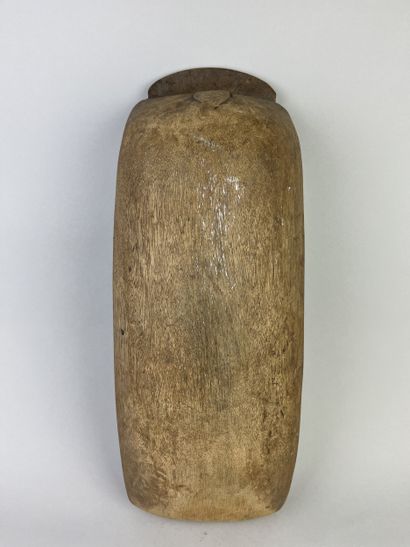 Pirogue scoop carved with a stylized human...