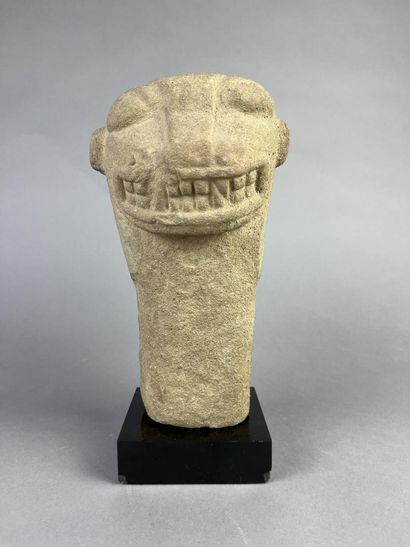 Feline head from an anthropo-zoomorphic deity....