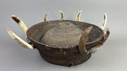 Round warrior's headdress, surrounded by...