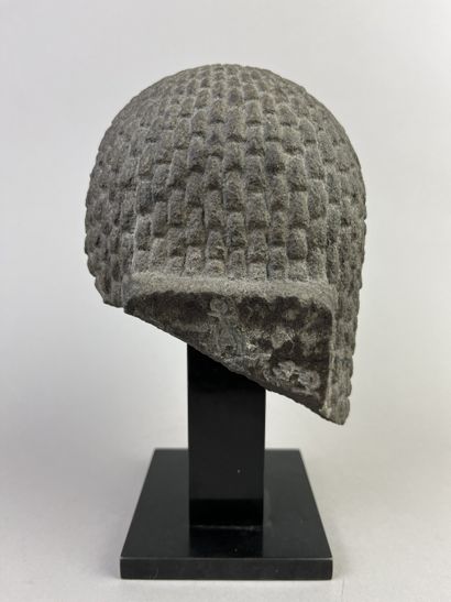 Female head wearing a curly wig. Hieroglyphic...