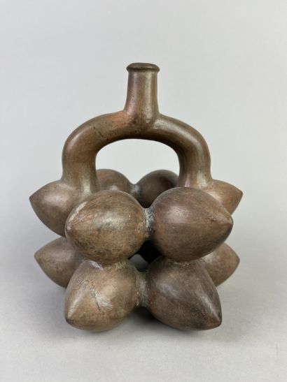 Vase representing twelve fruits (figs?) superimposed...