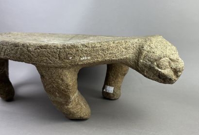 Metate. Corn grinding table in the shape...