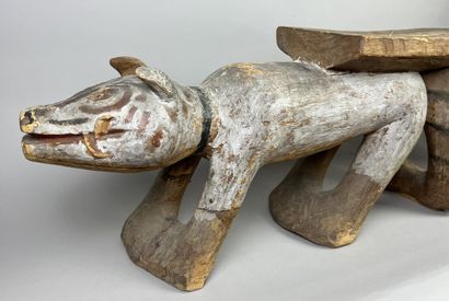 Seat composed of two animals side by side....
