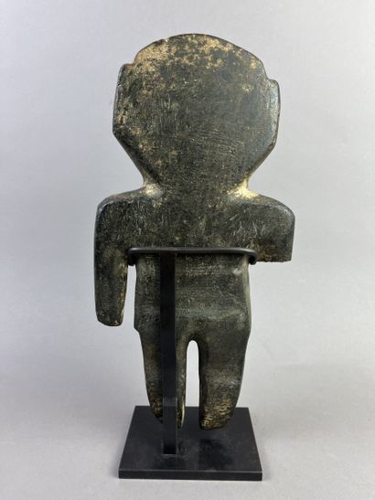 Anthropomorphic idol. Standing figure, arms...