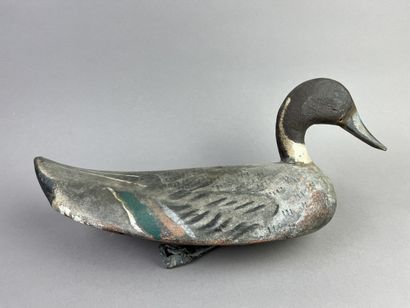 Antique wooden duck caller. Presence of its...
