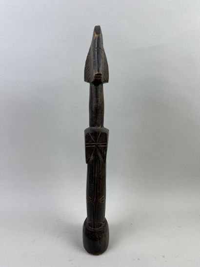 Fertility doll. Wood with brown patina. Height:...