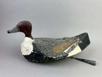 Antique wooden duck caller. Presence of its...
