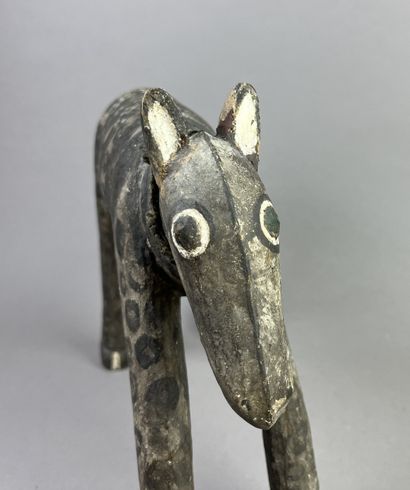 Sculpture of a horse resting on its four...