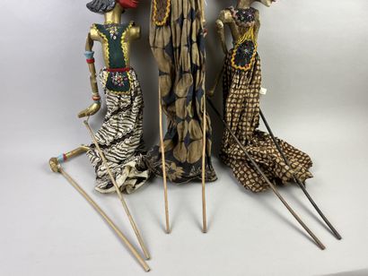 Three Wayang Golek rod puppets. The carved...