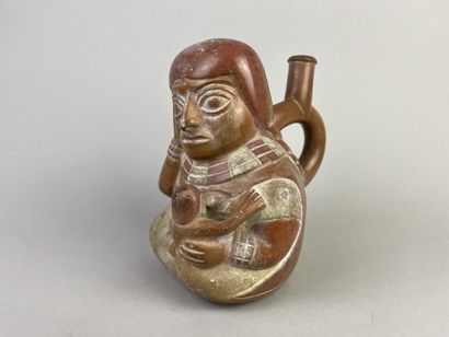 Vase representing maternity. The seated mother...