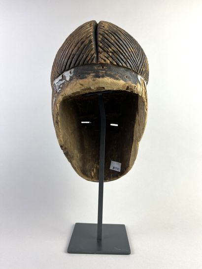 Okuyi facial mask, portrait of a young girl....