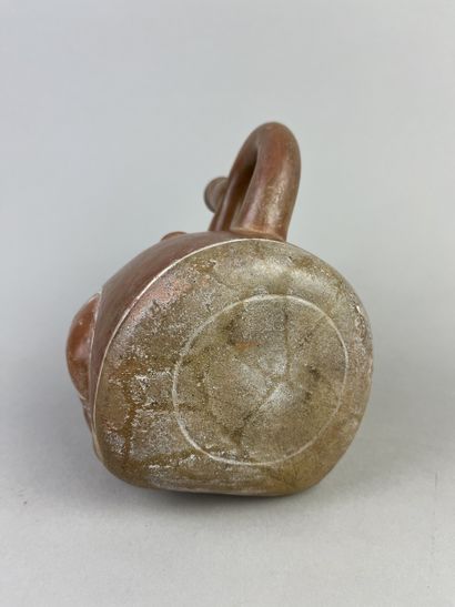 Vase representing maternity. The seated mother...