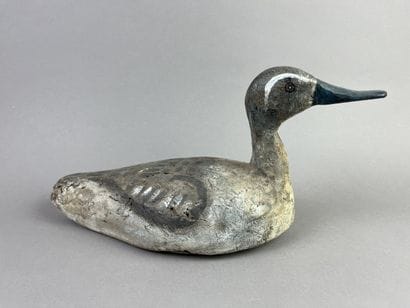 Antique wooden duck caller. Trace of polychromy....