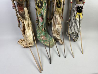 Four Wayang Golek rod puppets. The carved...