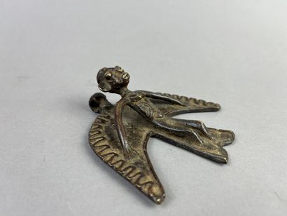 Crescent-shaped pendant featuring a large...