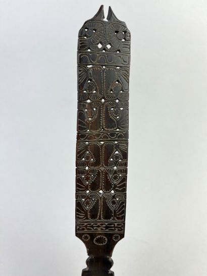 Large spoon decorated with geometric motifs....