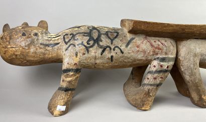 Seat composed of two animals side by side....