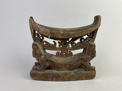 Beautiful old neck-rest featuring two figures...