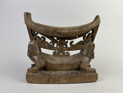 Beautiful old neck-rest featuring two figures...