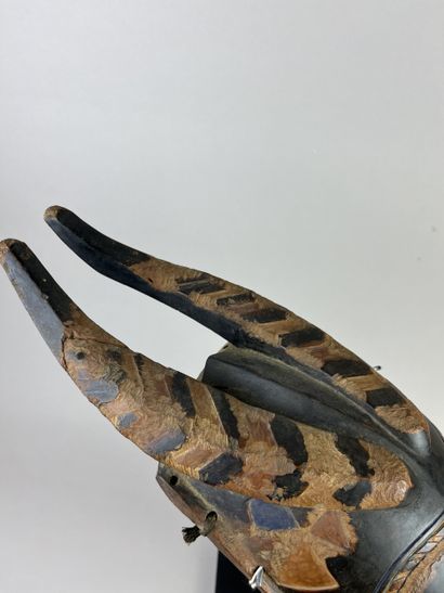 Old zamble mask. Representation of an antelope....