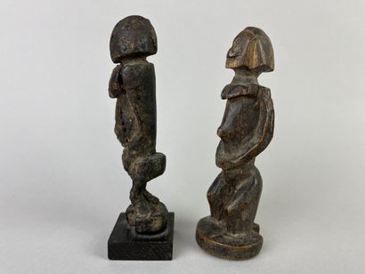 Two antique cubist-style small fetishes shown...