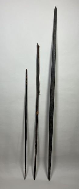 Three bows: One dark palmwood bow without...