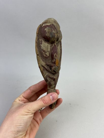 Small amulet head representing an ancestor's...