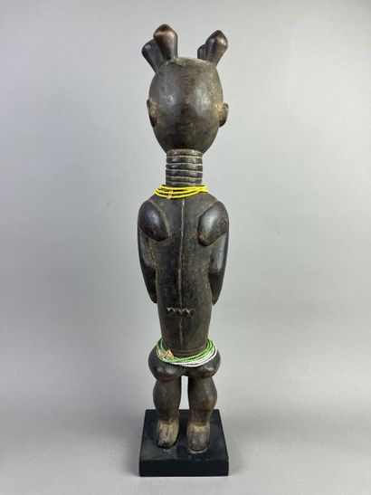 Standing female statue with arms detached...