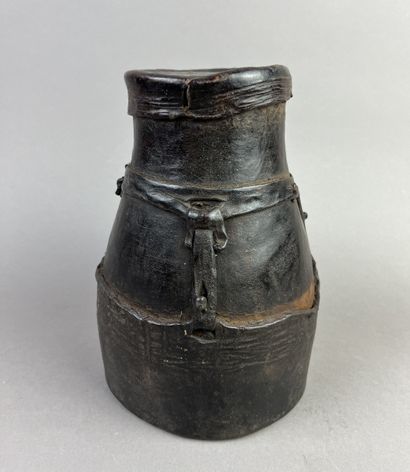 Small hand drum. Wood covered with buffalo...