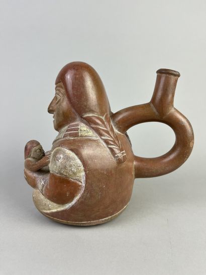 Vase representing maternity. The seated mother...