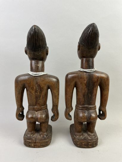 Pair of Ibedji. One male and one female,...