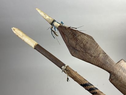 Two ceremonial dance sticks in the form of...