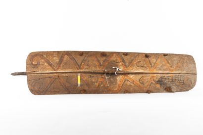 Large war shield surmounted by a representation...