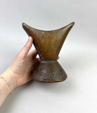 Neck rest. Wood with a beautiful brown patina...