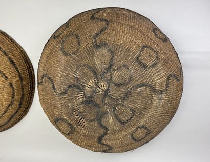 Two very old baskets for transporting and...