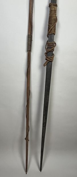 Two bows: An antique palmwood bow with dry...