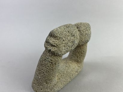 Metate pestle for grinding corn surmounted...