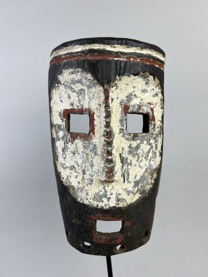 Mask with human face. The heart-shaped face...