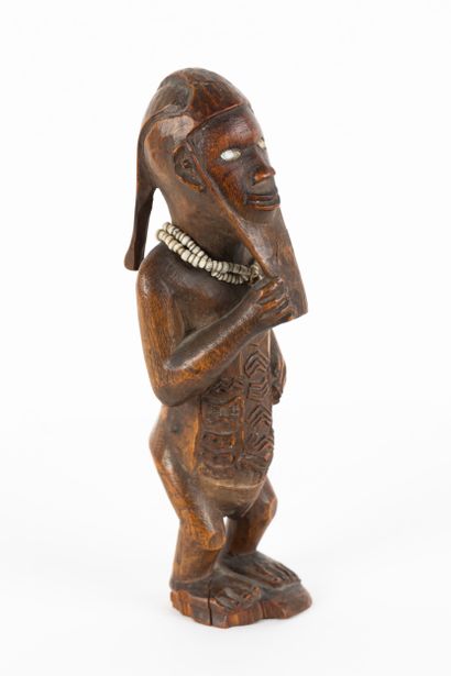 Mukuya ancestor. Male statuette, shown standing...