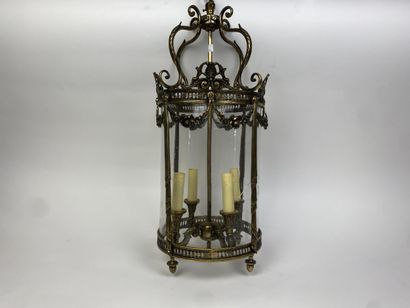 Deux lanternes de vestibule : 
- une cylindrique...
