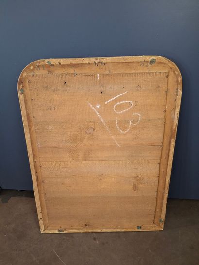 Miroir en bois et stuc doré à décor d'une...