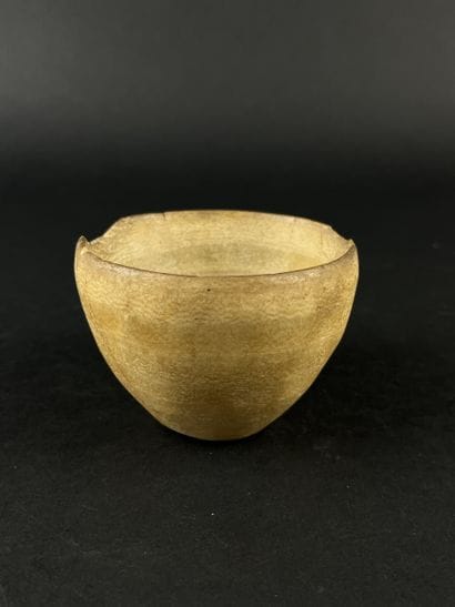 Hemispherical dish. Alabaster, visible chips....
