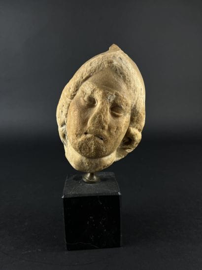 Head representing the helmeted goddess Minerva....