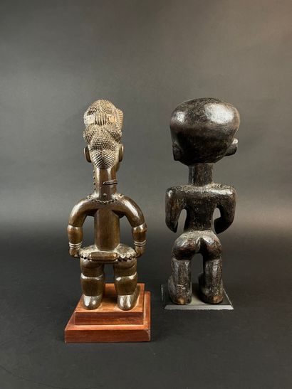 Two standing statuettes, one from Côte d'Ivoire,...
