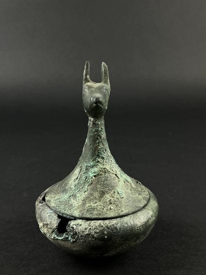 Vase with a zoomorphic head on the lid. Bronze....
