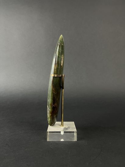 Polished green stone axe blade, (visible...