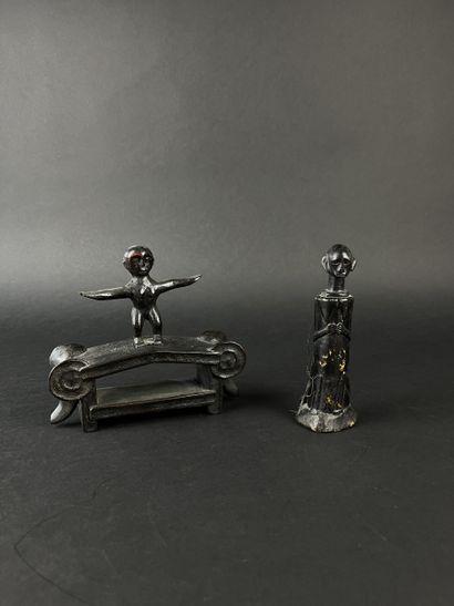 A figure with outstretched arms interlocking...